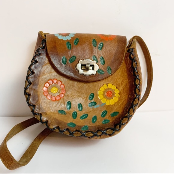 Vintage Handbags - Tooled Leather Boho Hippie 70’s Small Flower Power Braided Purse Swivel Closure